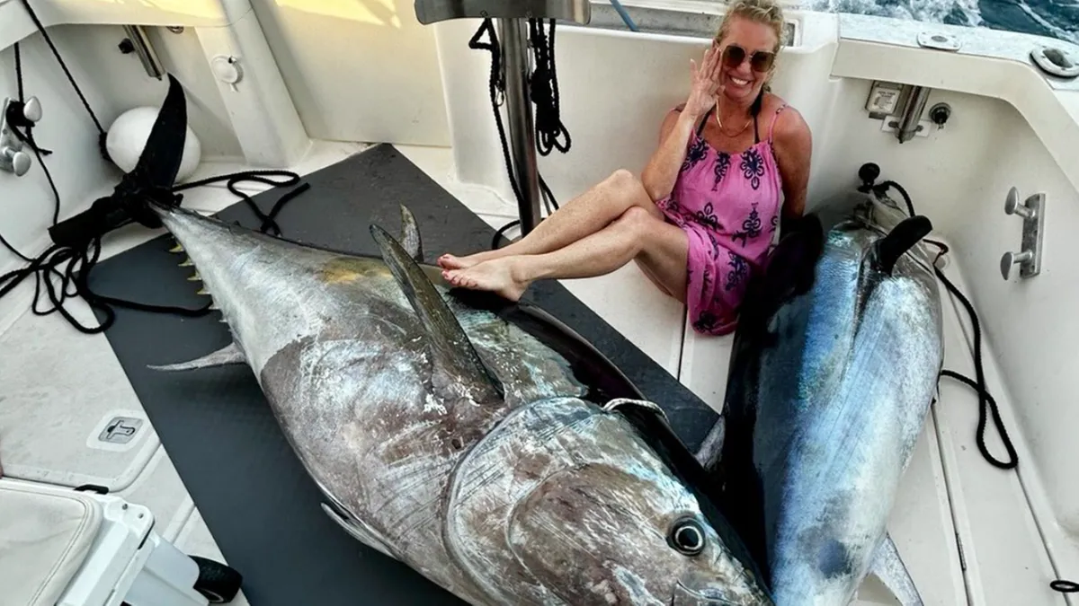 Polish lawmaker criticized over photo showing a fish she caught