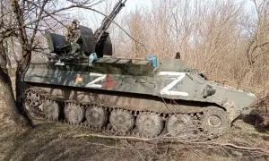 Фото: Зеленский пригласил журналистов на место найденного в Изюме массового захоронения людей