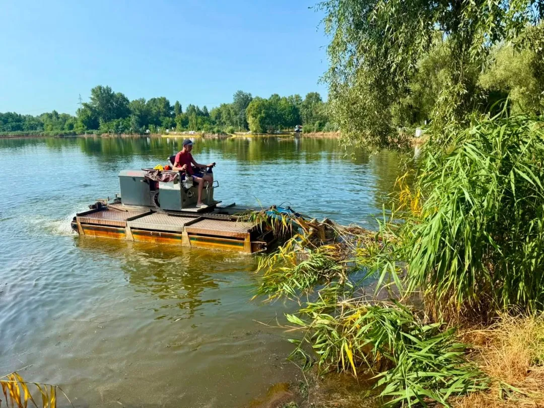 In Kyiv, cleanup efforts at Lake Kyrylivske are in their fourth week following the Russian attack