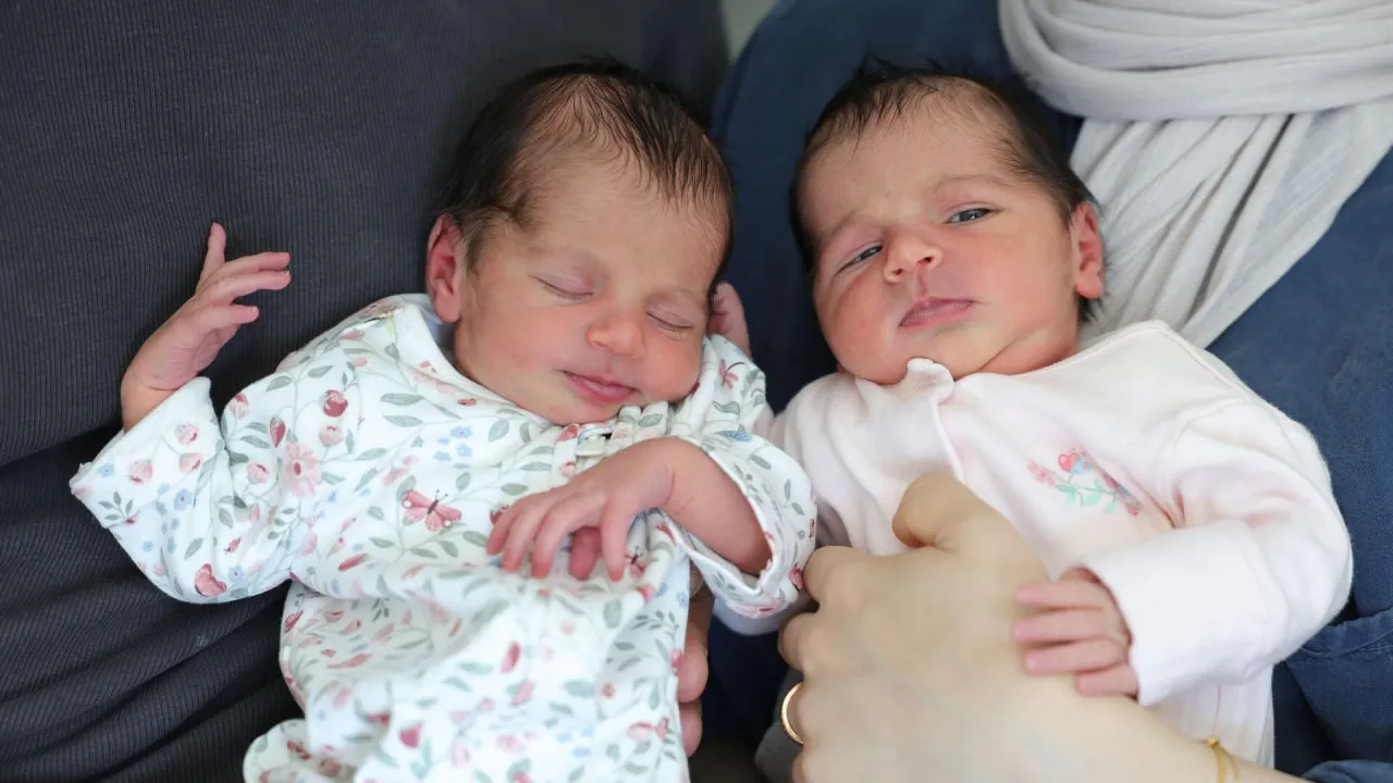 In Germany, twin sisters were born in different months