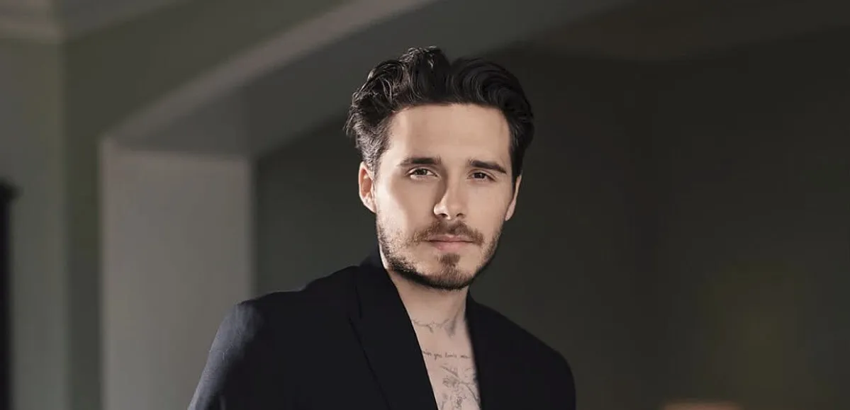 Brooklyn Beckham has started removing the tattoos he got in honor of his parents