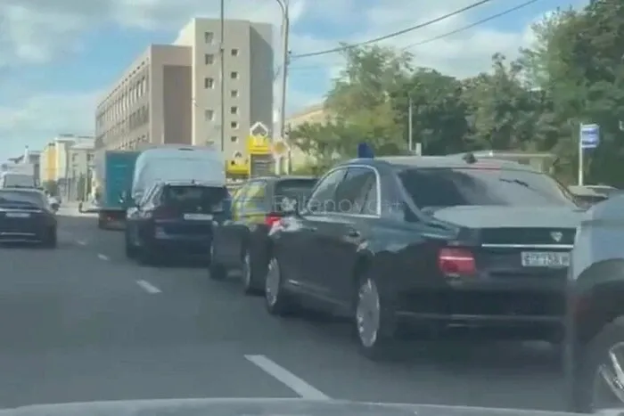 In Moscow, government-owned Aurus vehicles are waiting in line to fill up