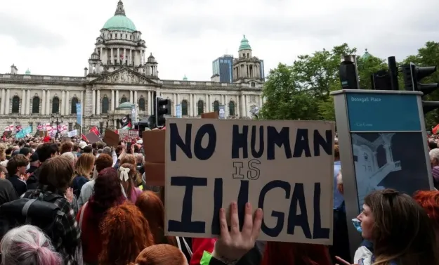 Thousands of people took to the streets in Belfast to march against racism