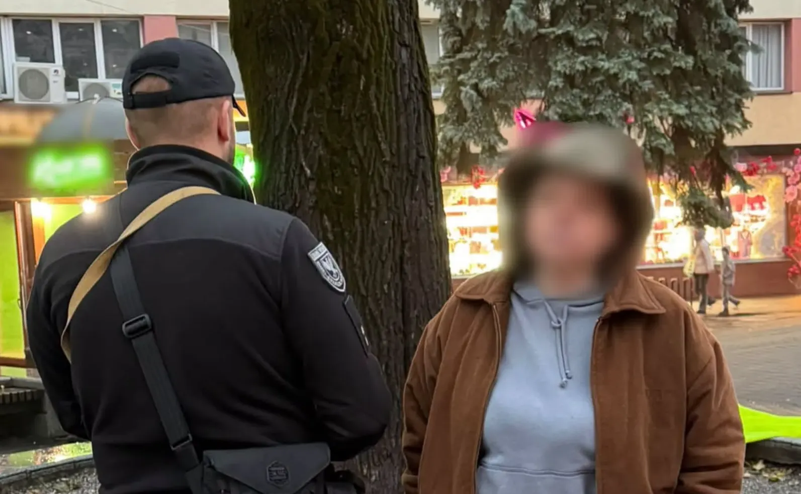 In Ivano-Frankivsk, a woman set a Ukrainian flag on fire