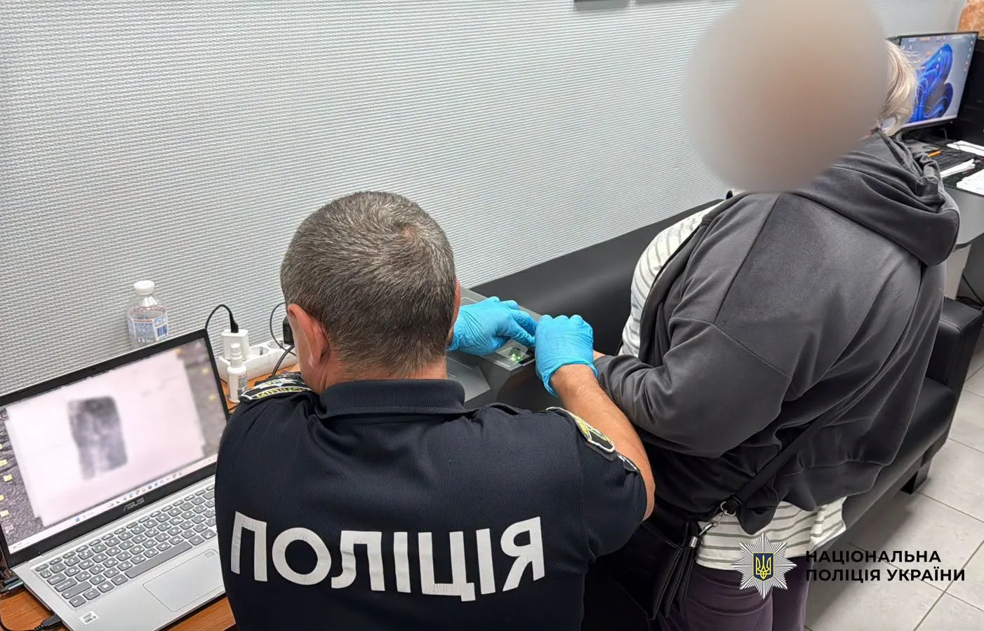 Photo: Kharkiv woman detained for selling pornographic content to her child