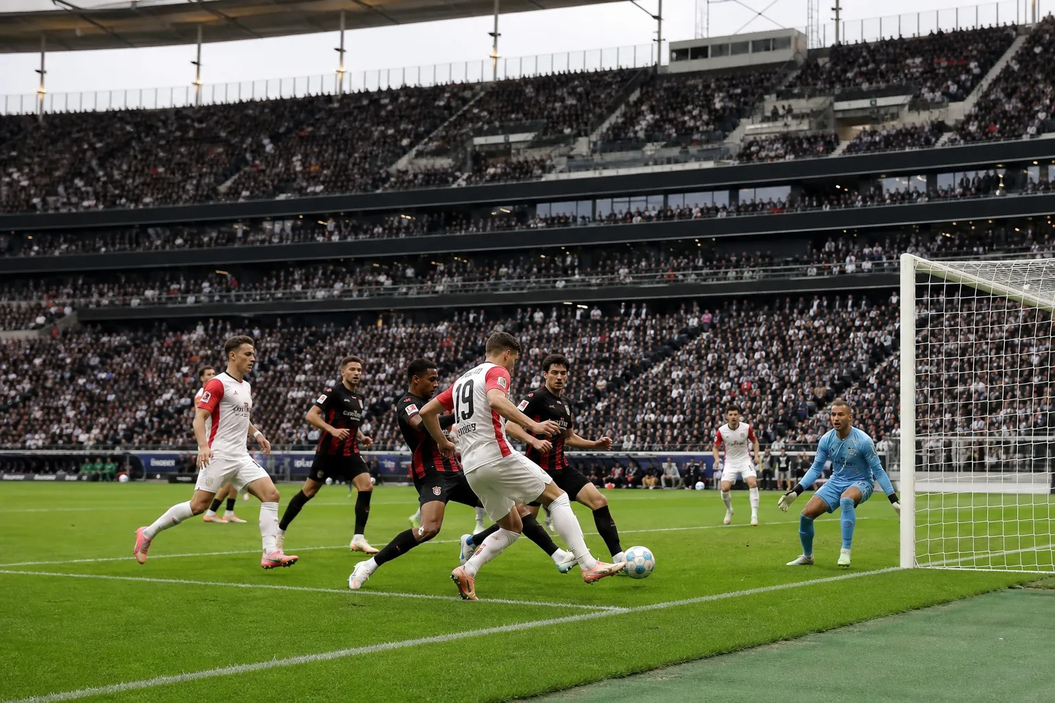 Augsburg top Bundesliga after win in Frankfurt, Germany