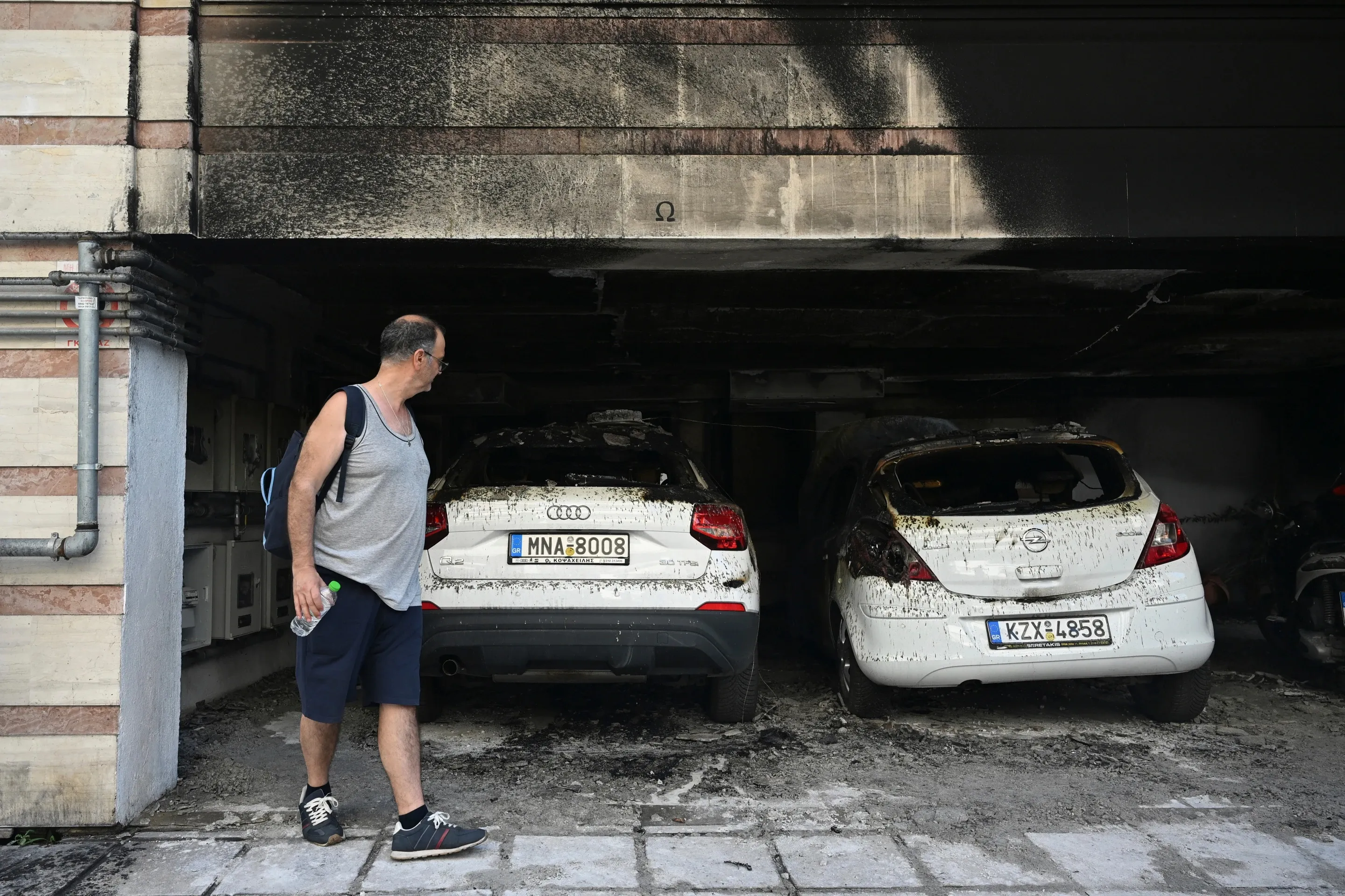 In Greece, cars were set on fire near the homes of members of the ruling party