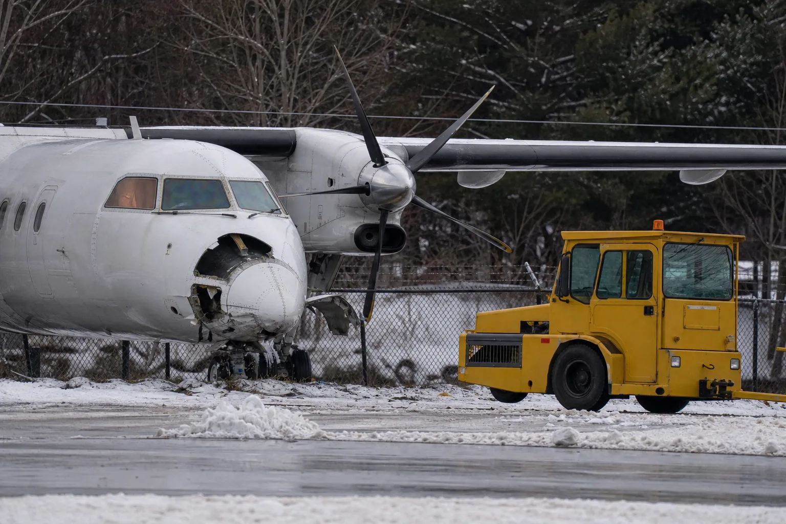 Car damages plane at airport in New Hampshire