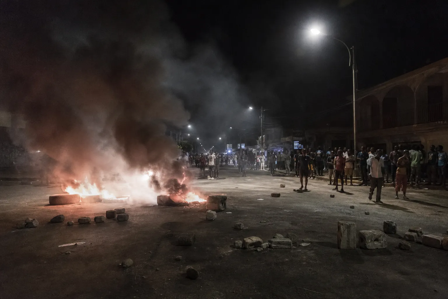 In Gambia, protesters burned tires over prolonged power outages