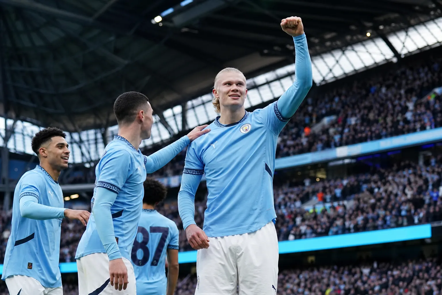 Manchester City beat Coventry and top the Premier League table