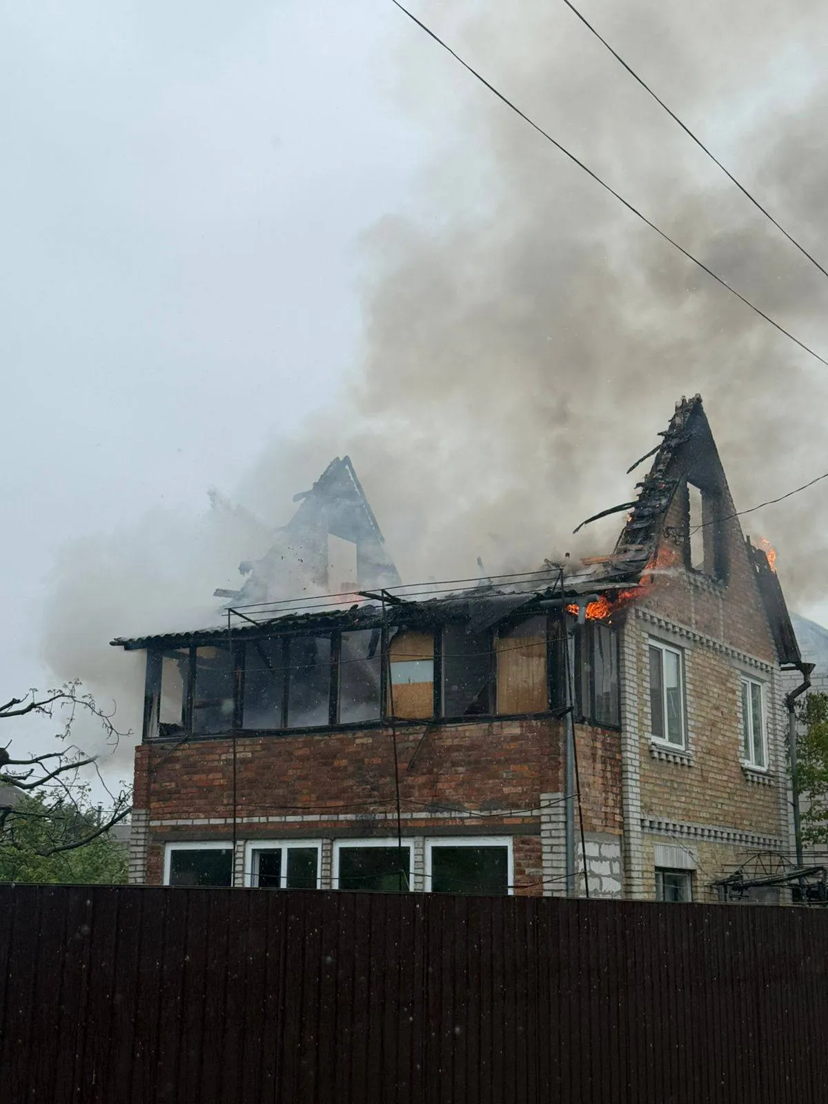 A private home caught fire in the Kyiv region following a drone attack by Russian forces