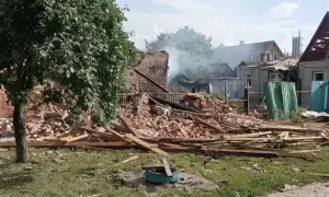 A Russian nighttime attack on Kyiv claimed the life of a man; his 16-year-old son lost an arm