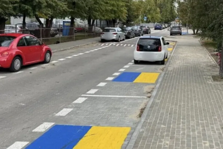 A scandal has erupted in Poland over blue-and-yellow parking spaces near a school