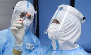 ВОЗ проверяет новую версию возникновения коронавируса в китайском Ухане