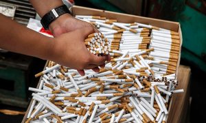 В Украине планируют запретить продажу сигарет и алкоголя за наличные 