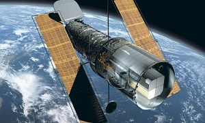 Телескоп «Хаббл» снял галактику странной формы – у нее есть «соцветия»